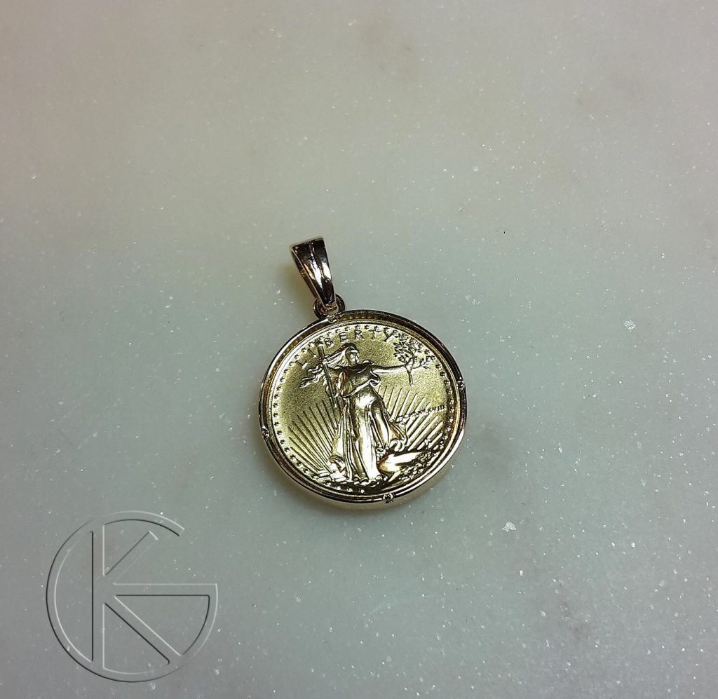 Kullast ripats kuldmündiga