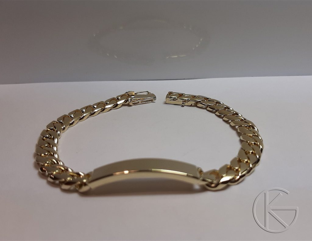 Kullast pantser käekett plaadiga