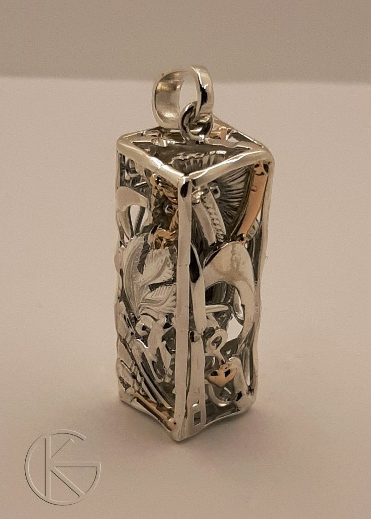 Hõbedast ja kullaga ripats - kasutatud ehete kogum